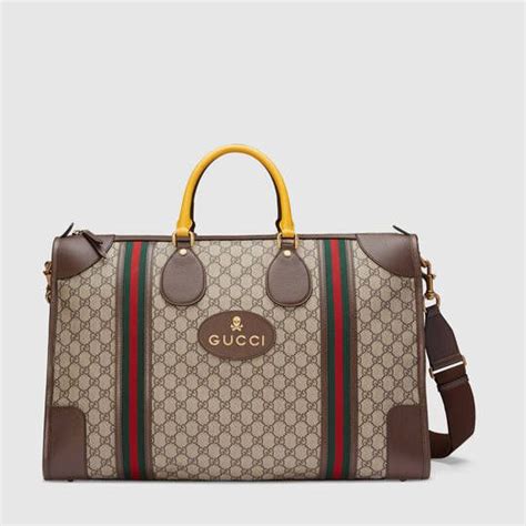 Bagagli e borsoni da uomo di Gucci .